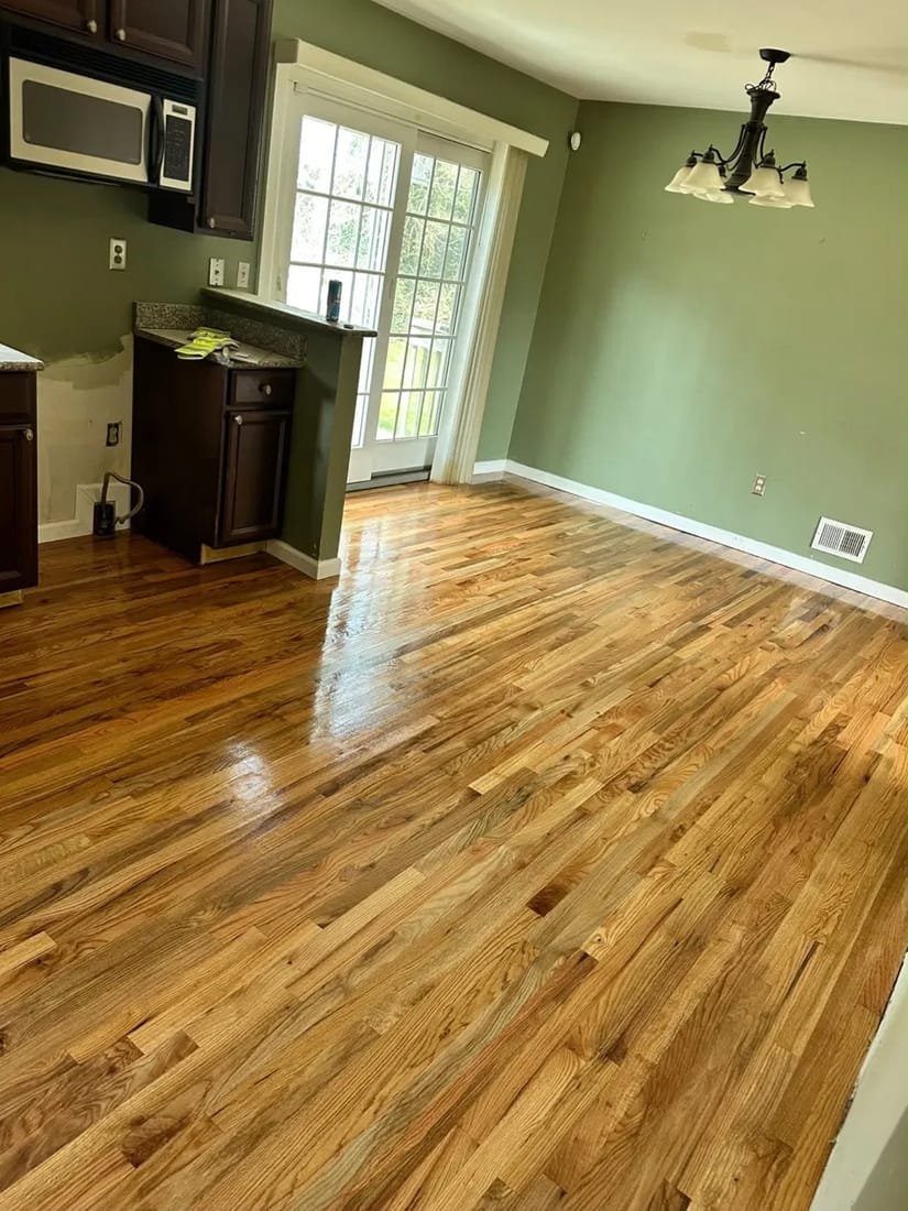 Refinished hardwood floor in a kitchen