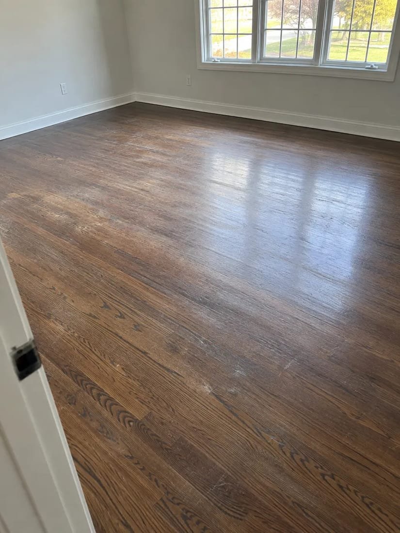 Refinished hardwood floor in a second living room